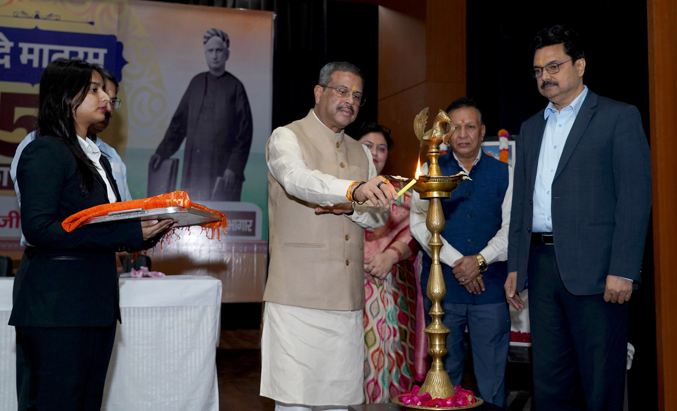 Shri Dharmendra Pradhan lighting the lamp during the commemorative event marking 150 years of the National Song “Vande Mataram”