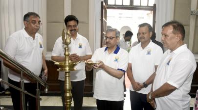 Dr. Vineet Joshi lighting the lamp during the 11th International Day of Yoga celebrations