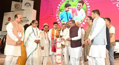 Shri Dharmendra Pradhan lighting the lamp during the Inaugural Session of ABSS 2025