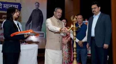 Shri Dharmendra Pradhan lighting the lamp during the commemorative event marking 150 years of the National Song “Vande Mataram”
